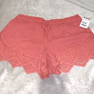 Cute shorts with eyelet detail